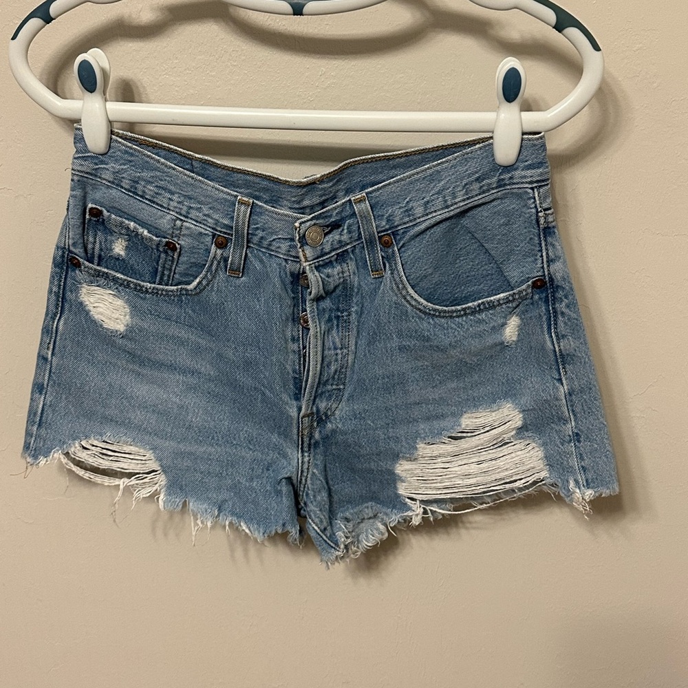 Levi’s Blue Jean Shorts with Frayed Hem and Distressed Look